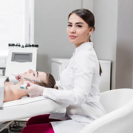 Beautician Performing Microneedling Treatment On Client | SpaGo MedSpa in Erie, PA